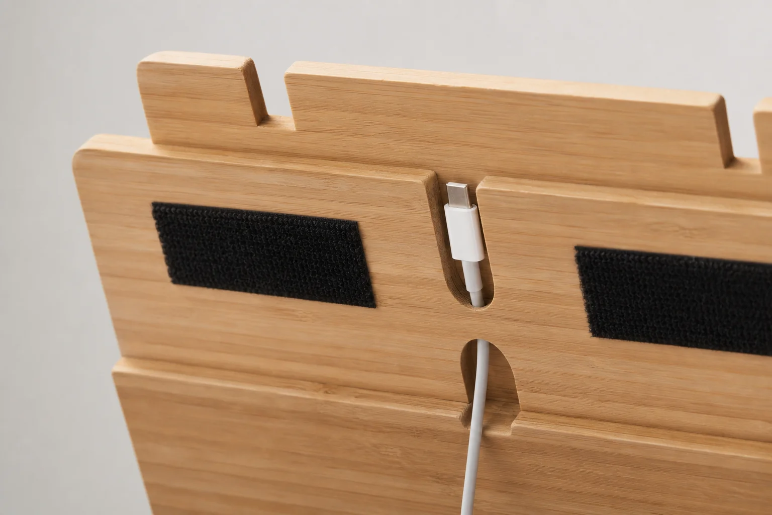 Tablet mounting area with USB charging cable cutout and velcro attachment points