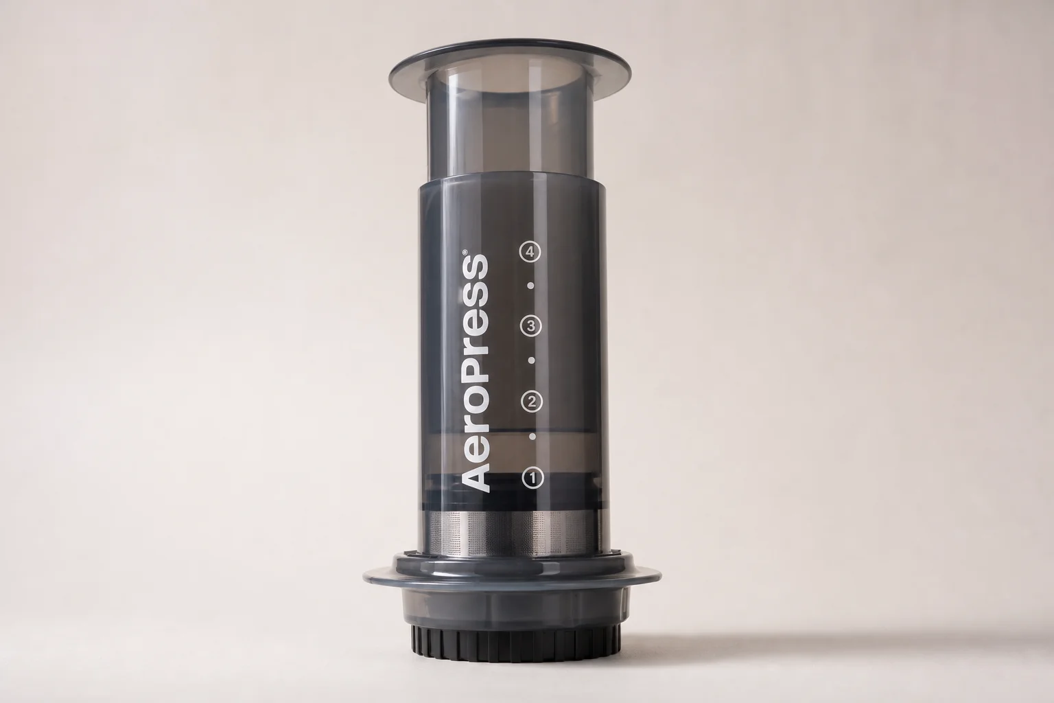 Three coffee machines arranged on a motorhome table: AeroPress, Nespresso Essenza Mini, and Ozito