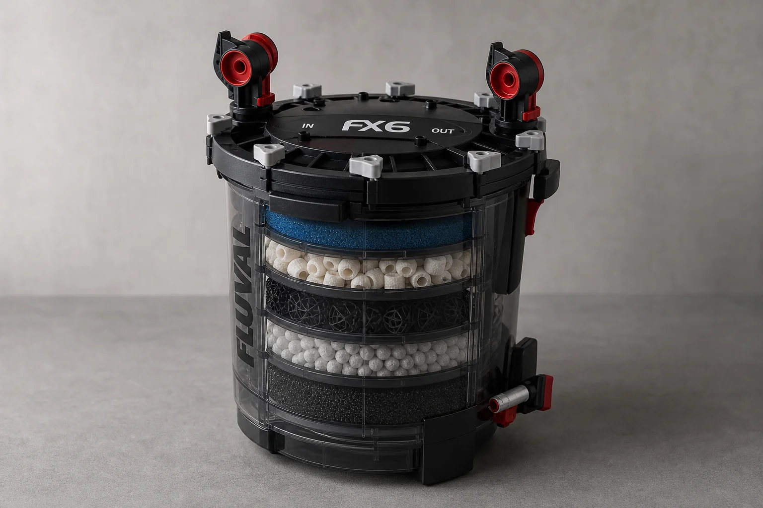 Fluval FX6 canister filter with visible internal media trays on grey surface