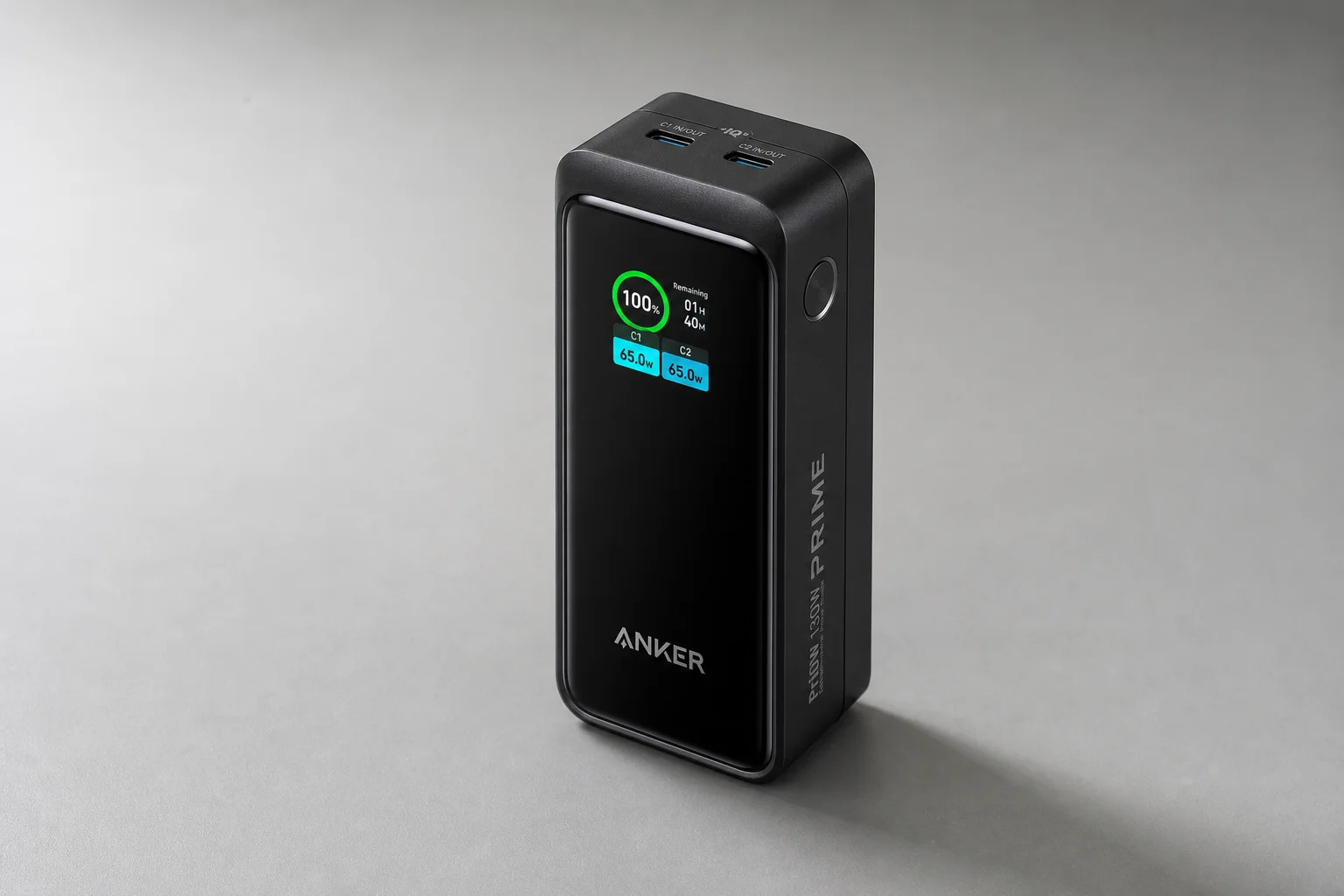 Six Anker power banks arranged on concrete surface showing size and design differences