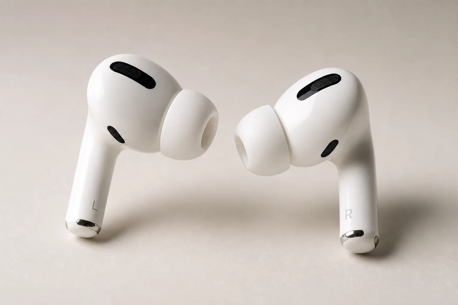 Nine earbud models arranged on concrete surface representing budget to premium options