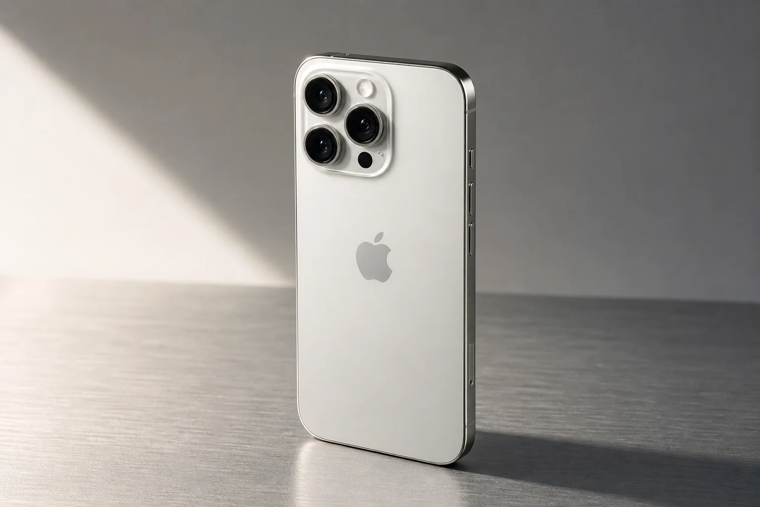 Apple iPhone 16 Pro and Sony RX100 Mark VII cameras side by side on grey backdrop