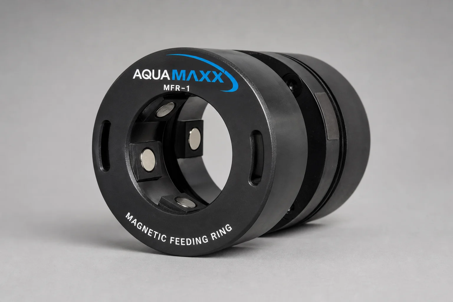 Array of automatic fish feeders and feeding rings on concrete surface