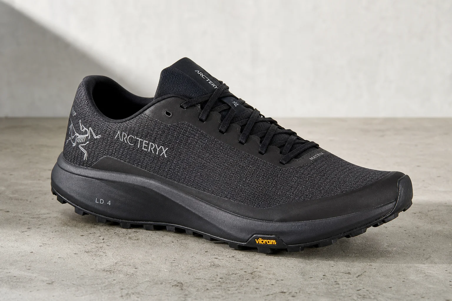 Arc'teryx Sylan Pro trail running shoe on neutral backdrop showing Matryx upper and Vibram outsole