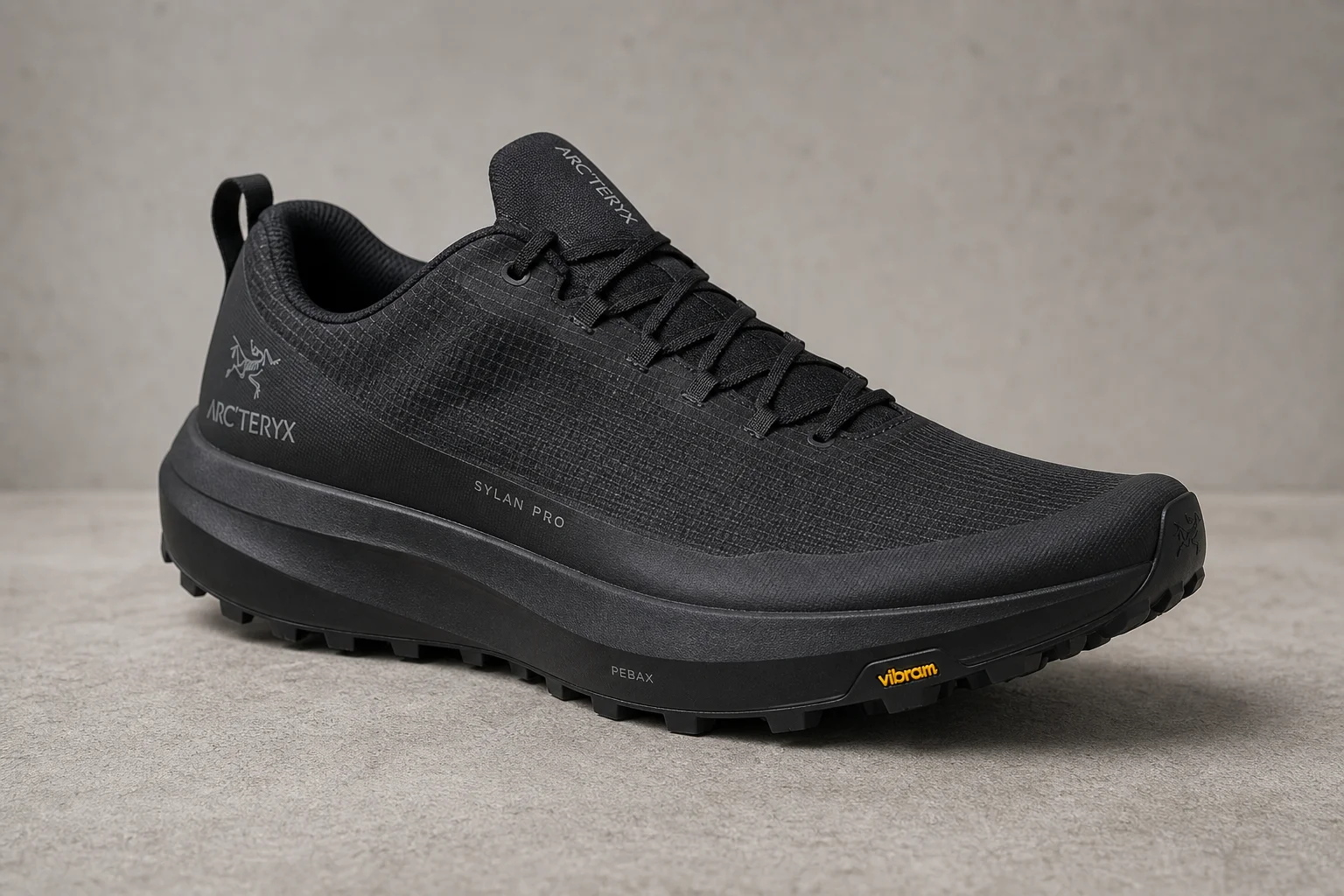 Arc'teryx Sylan Pro trail running shoe on neutral backdrop showing Matryx upper and Vibram outsole
