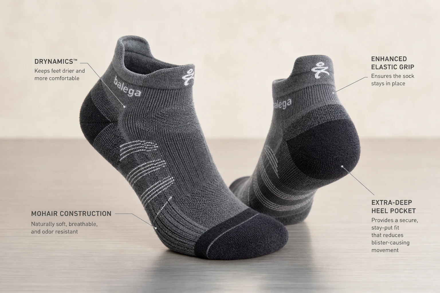 Collection of various running socks in different colors and styles on neutral backdrop