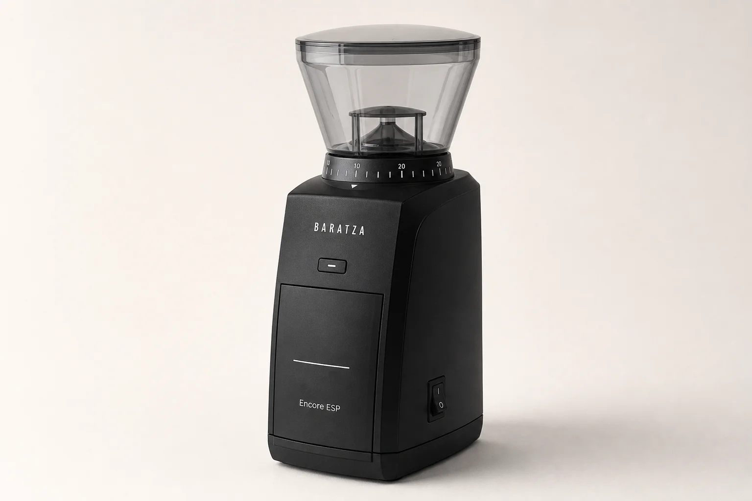Five espresso grinders arranged in a row on concrete surface