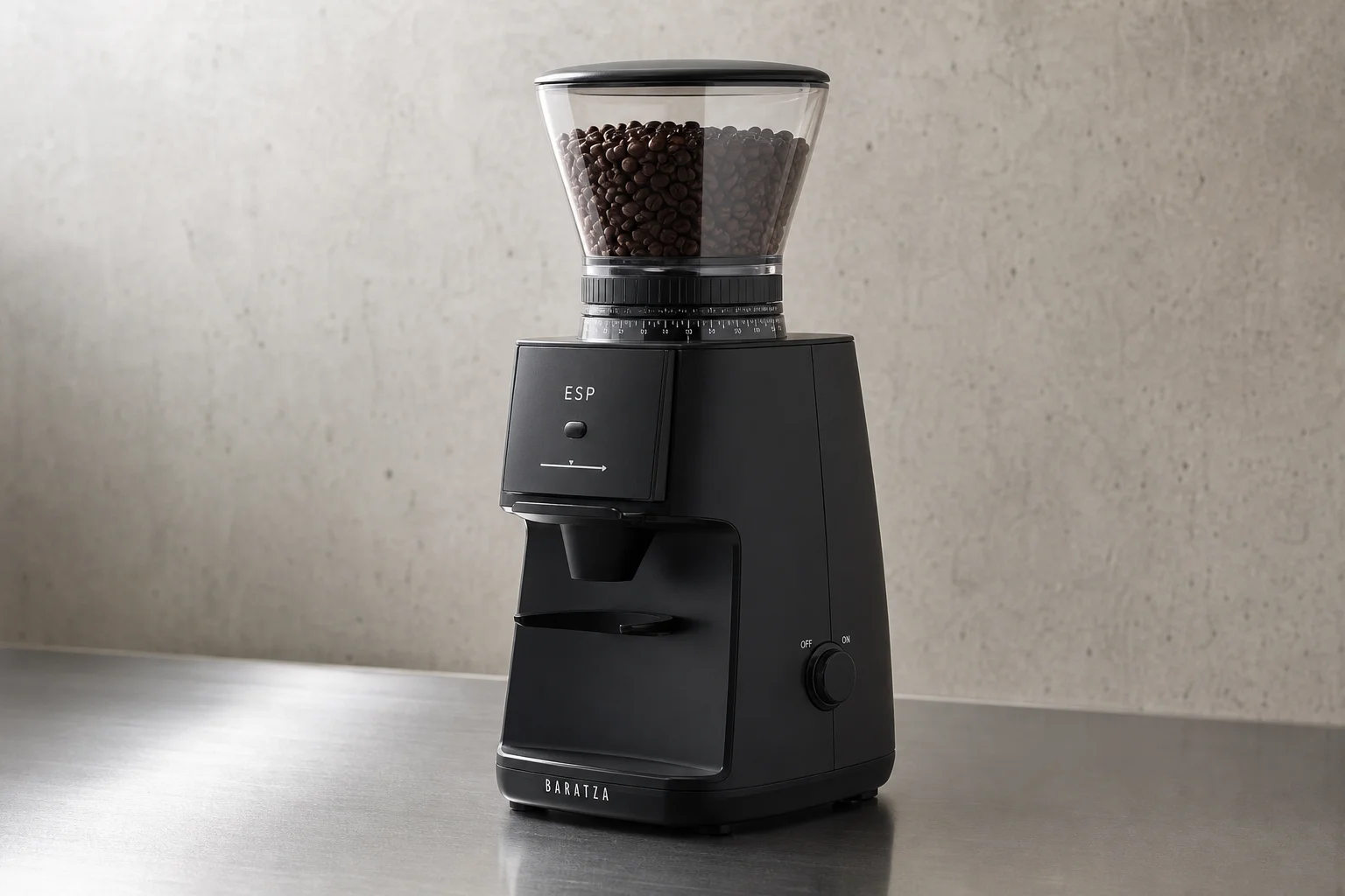 Premium burr grinder, specialty coffee bag, and pour-over dripper on concrete surface
