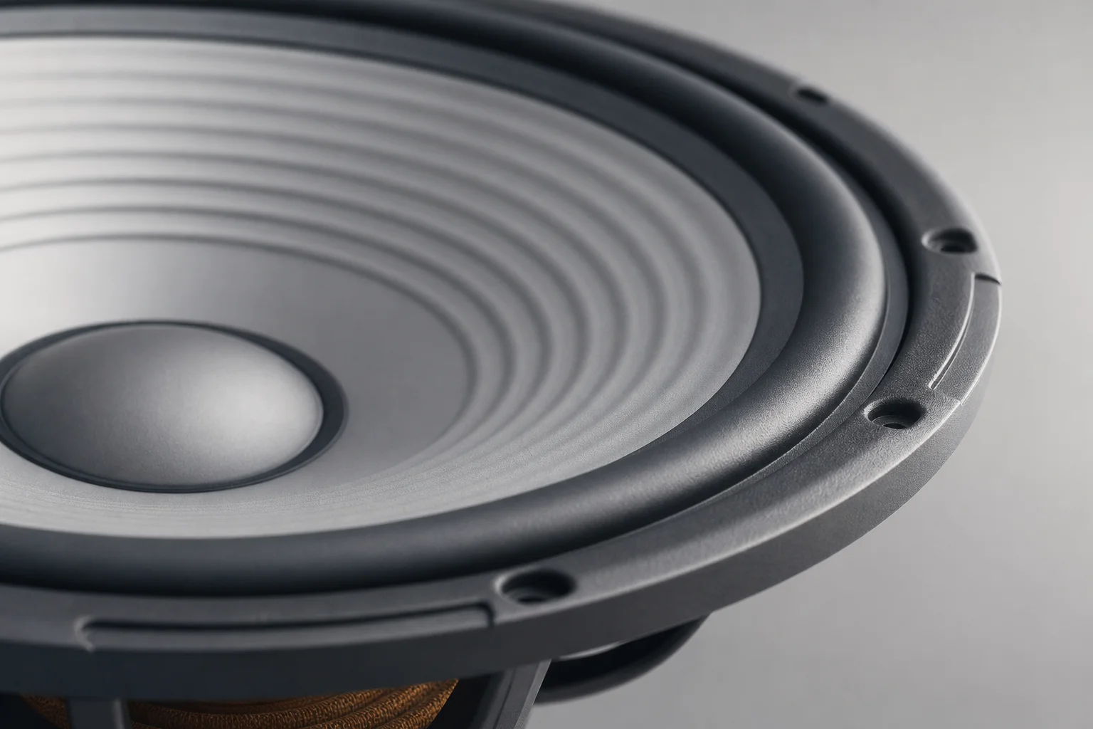 Bass driver cone showing aluminum and composite materials in detail