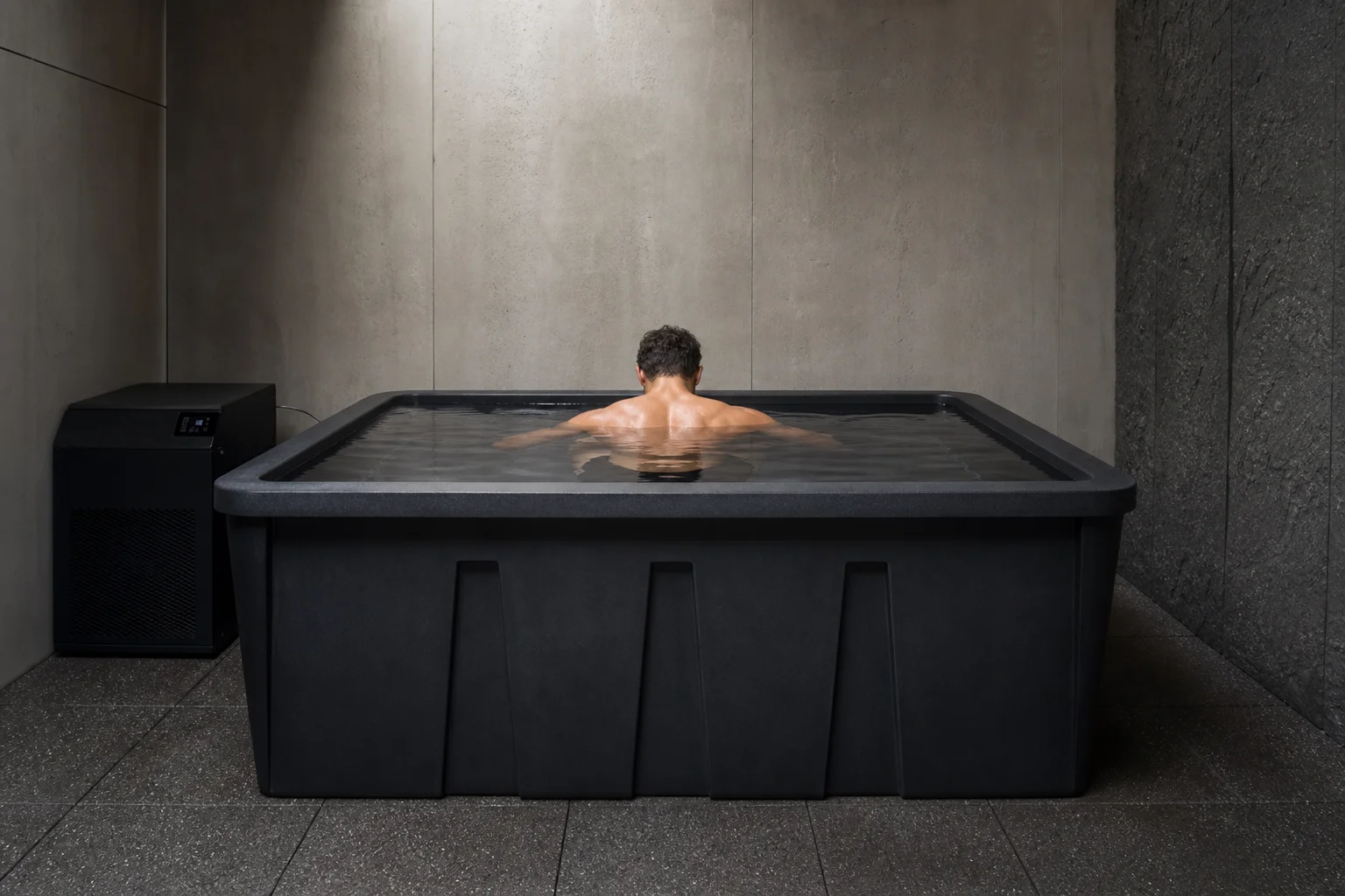 Athlete submerged in cold water inside a premium ice bath tub