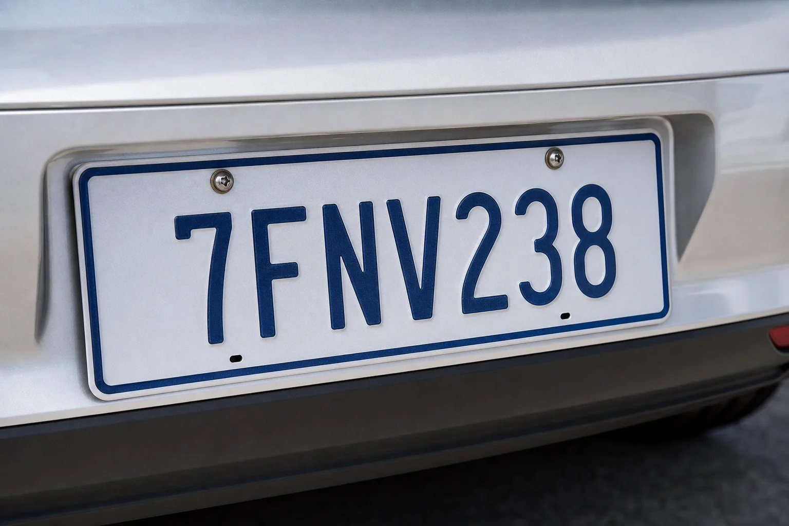 Close-up of vehicle license plate in daylight