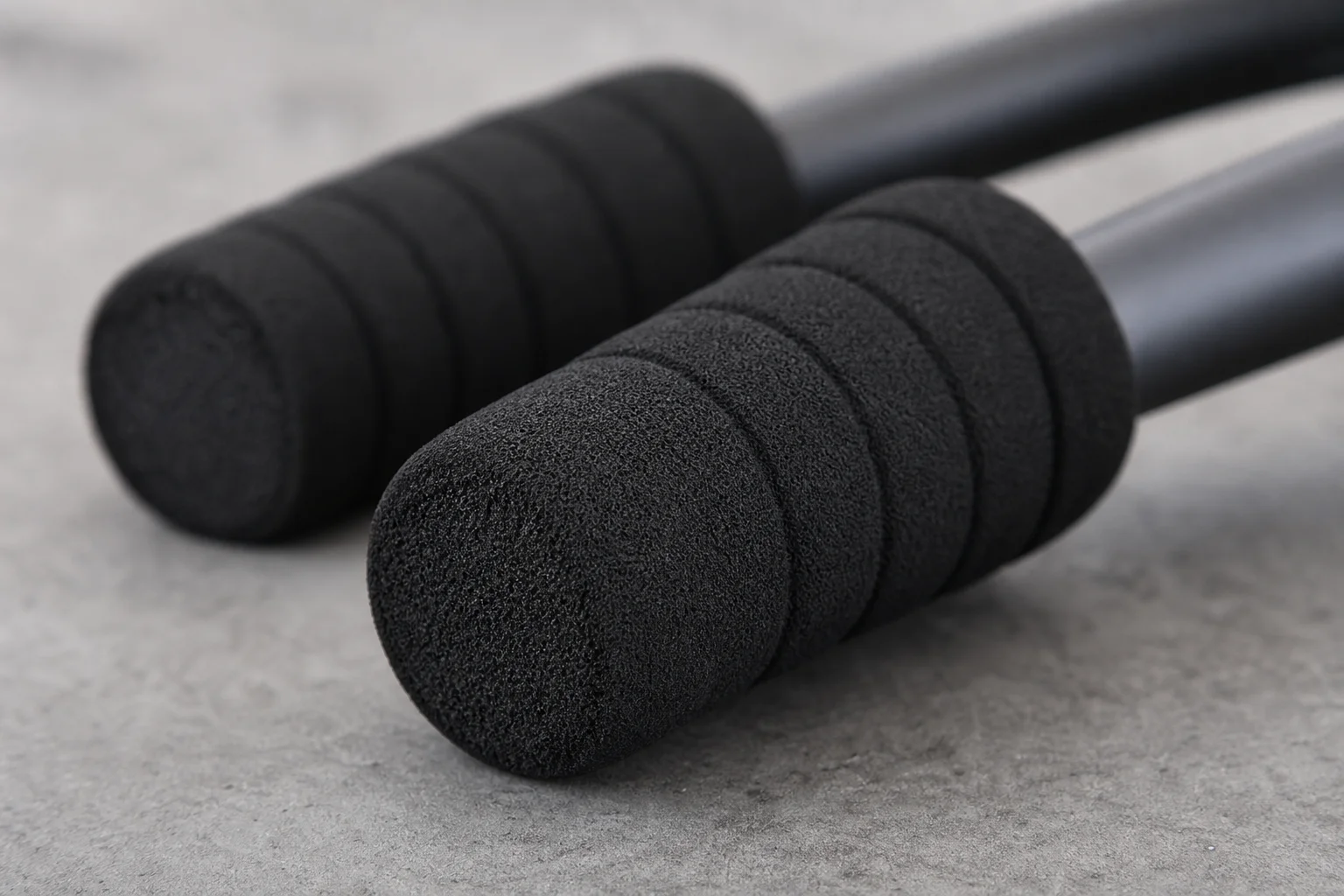 Close-up detail of door handle grips showing texture and diameter