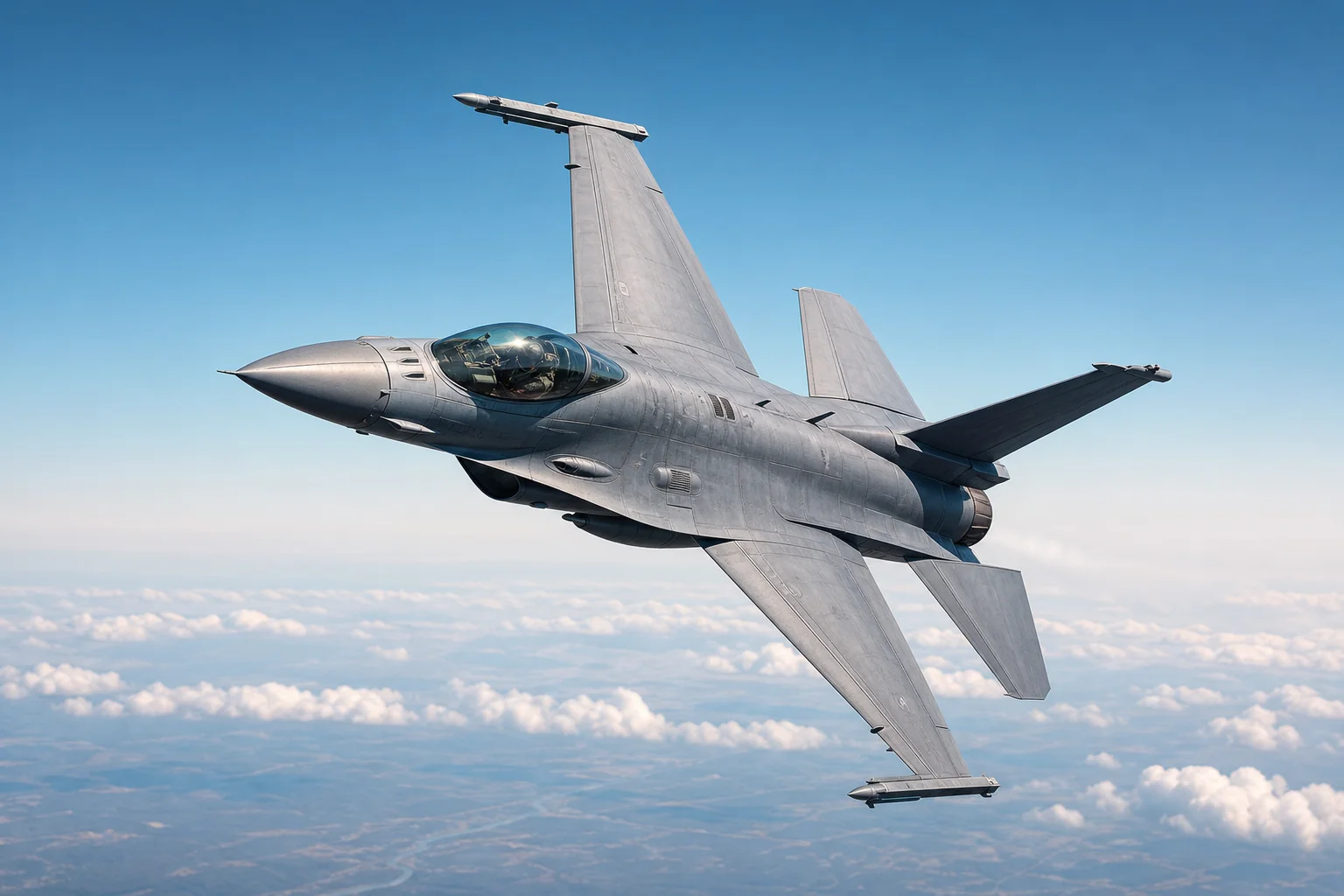 Fighter jet in aerial combat maneuver against blue sky