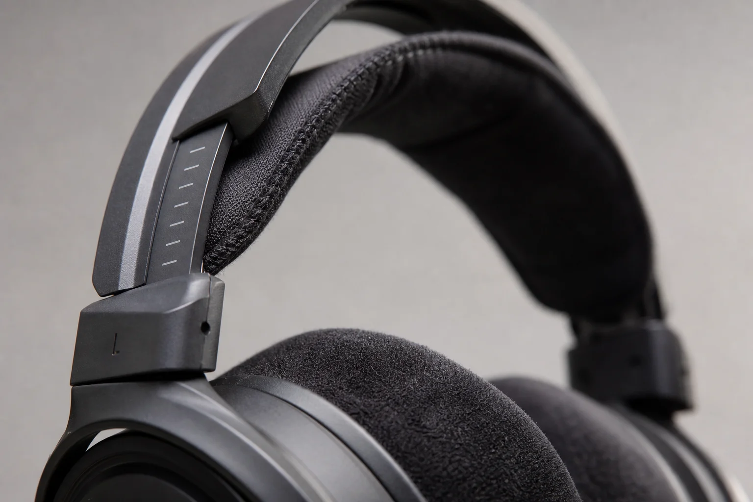 Close-up of gaming headset earpads and suspension system details