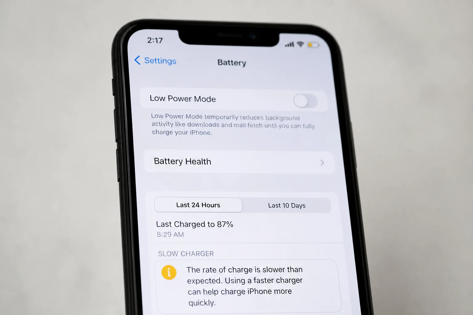 iPhone screen showing slow charger warning notification