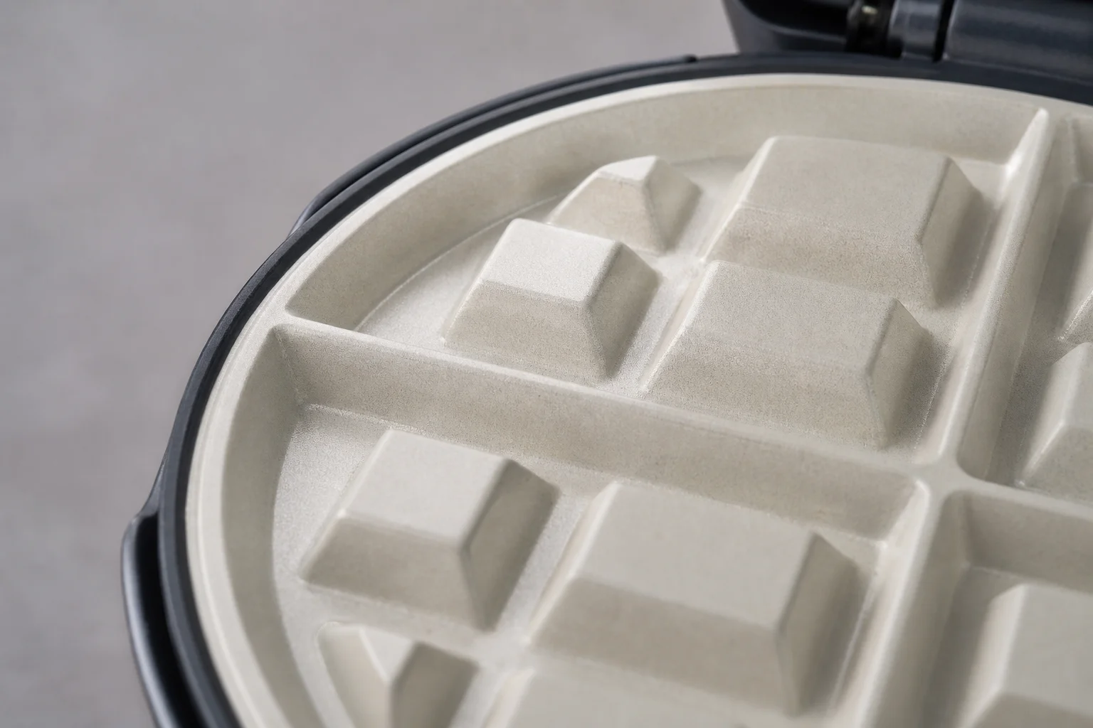 Close-up of ceramic non-stick coating on waffle maker plates