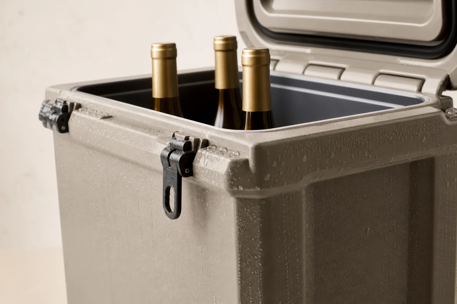 Wine bottles chilling inside a tall hard cooler