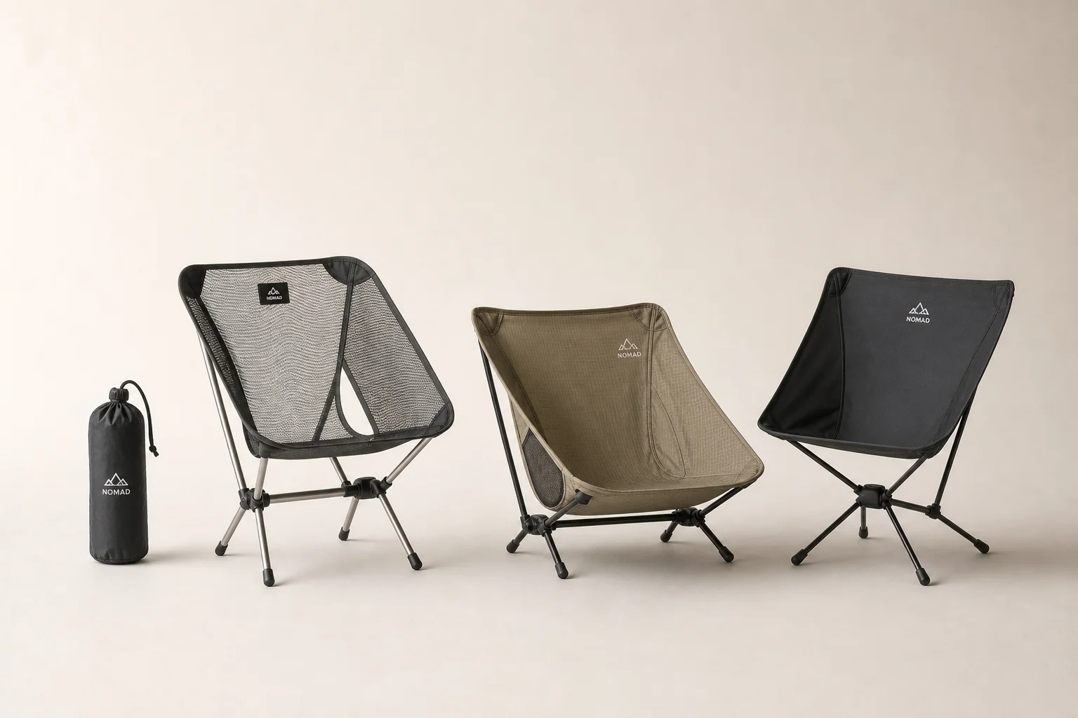 Four ultralight camping chairs arranged on neutral backdrop