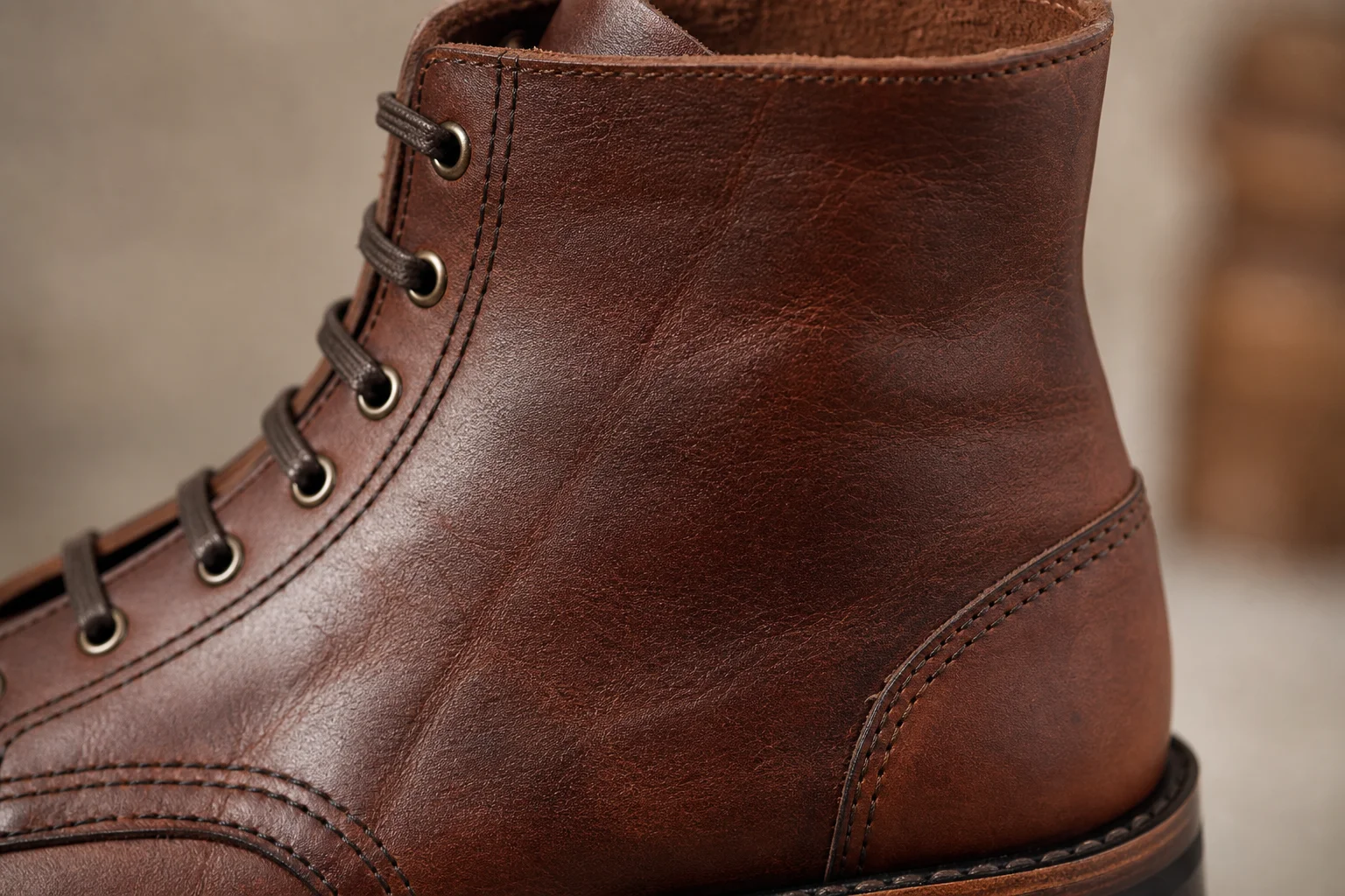 Close-up of boot leather and stitching detail showing craftsmanship