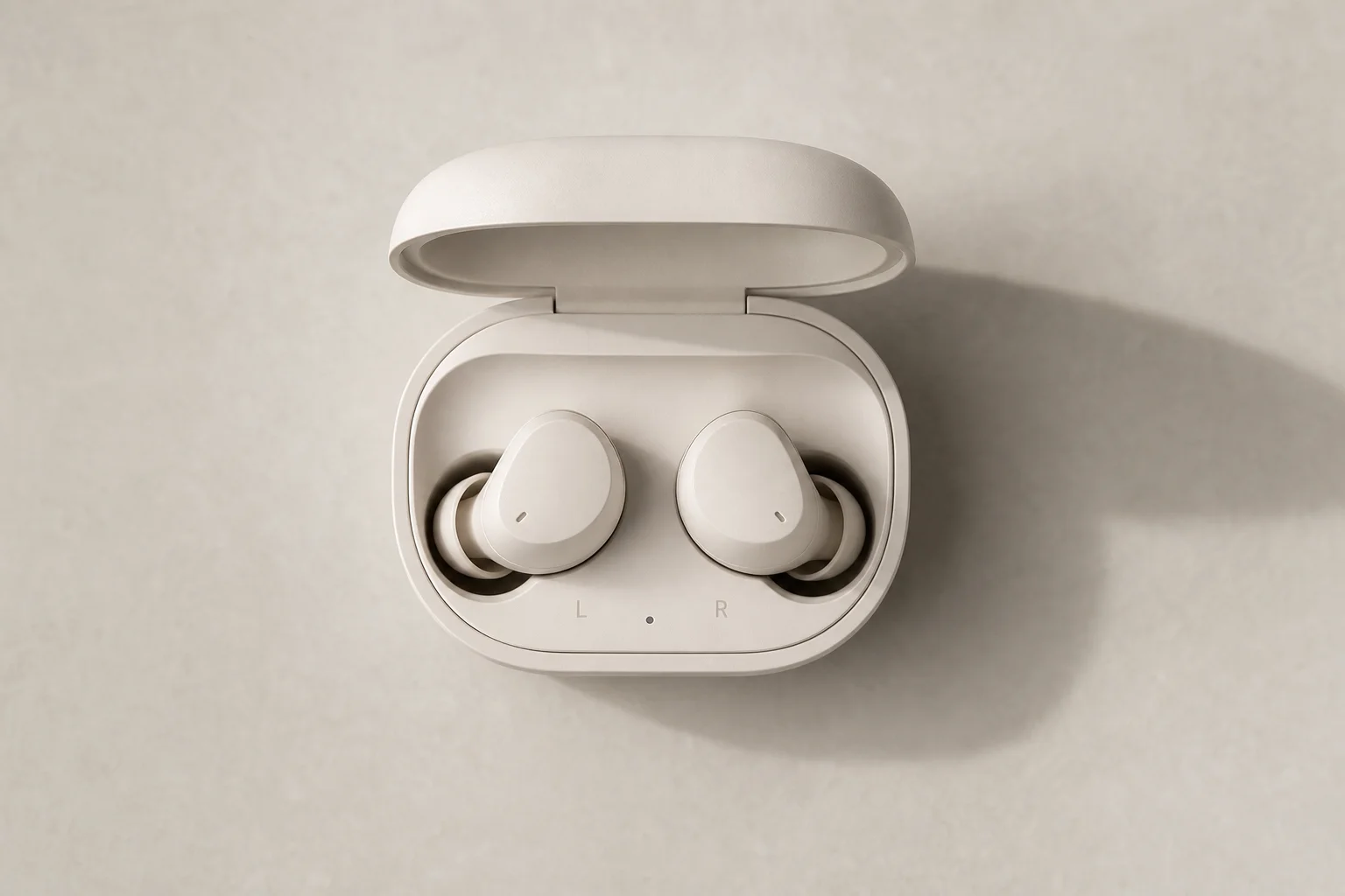 Close-up of wireless charging case with earbuds inside
