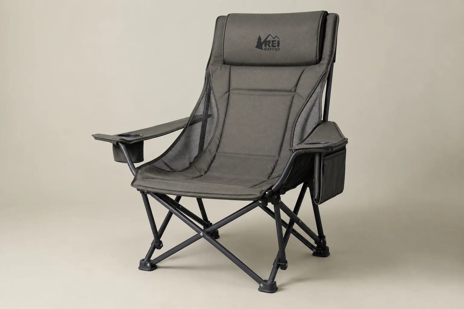 Five lightweight camping chairs arranged on concrete surface showing design variety