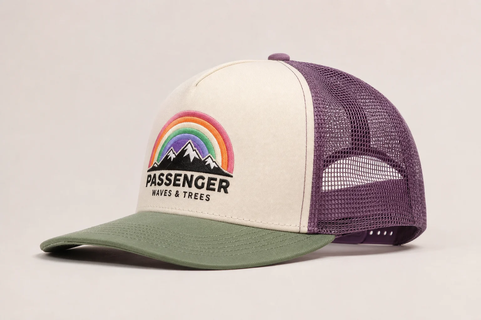 Nine running caps in various styles and colors arranged on neutral backdrop