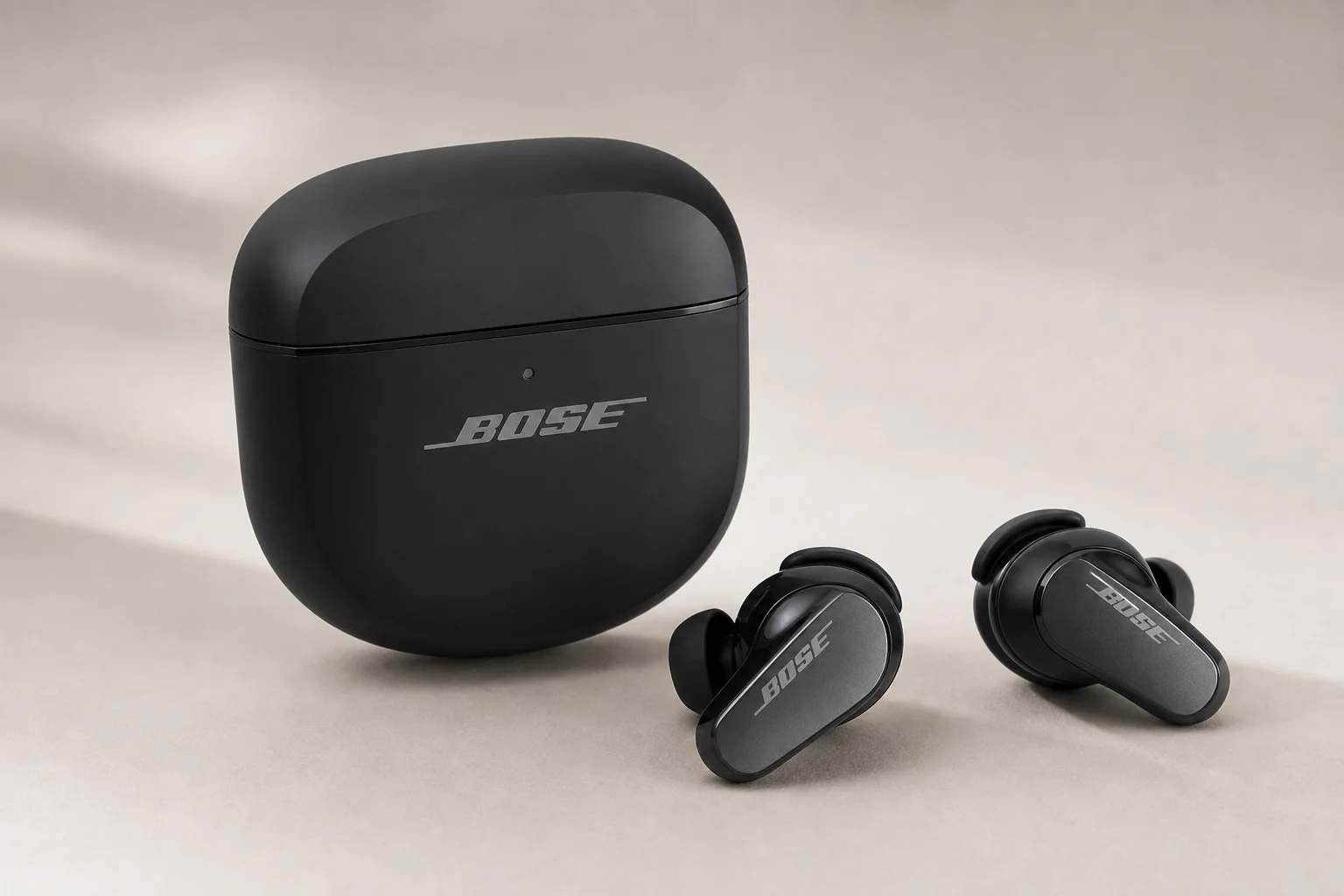 Nine earbud models arranged by price tier on concrete surface