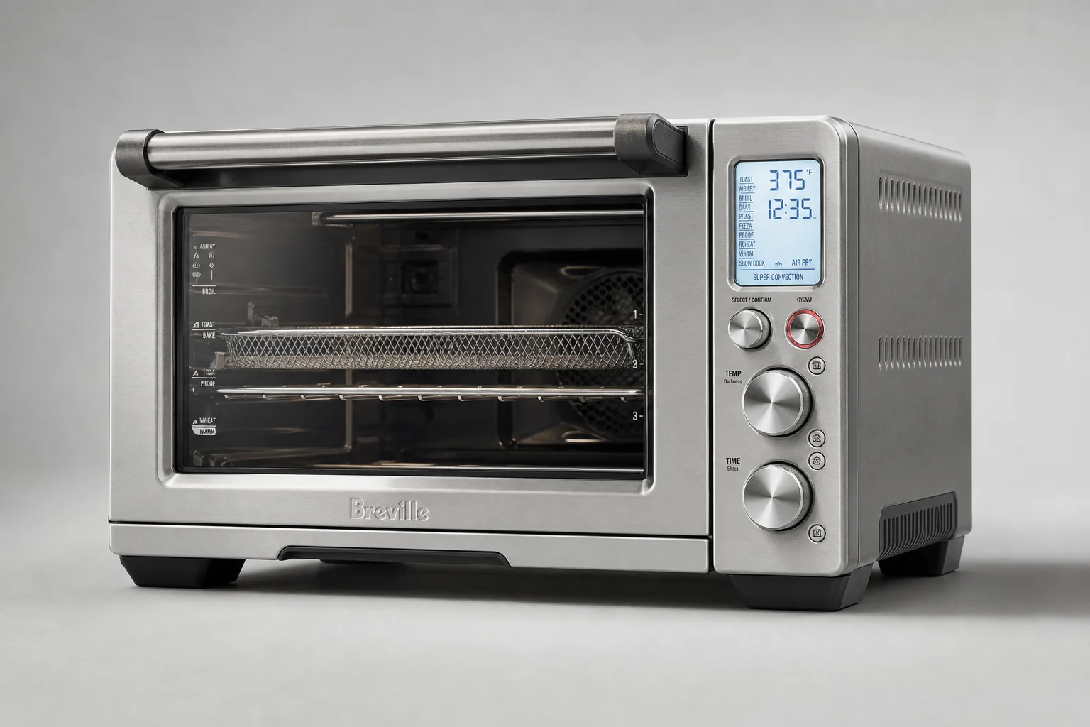 Three air fryer toaster ovens lined up on concrete surface