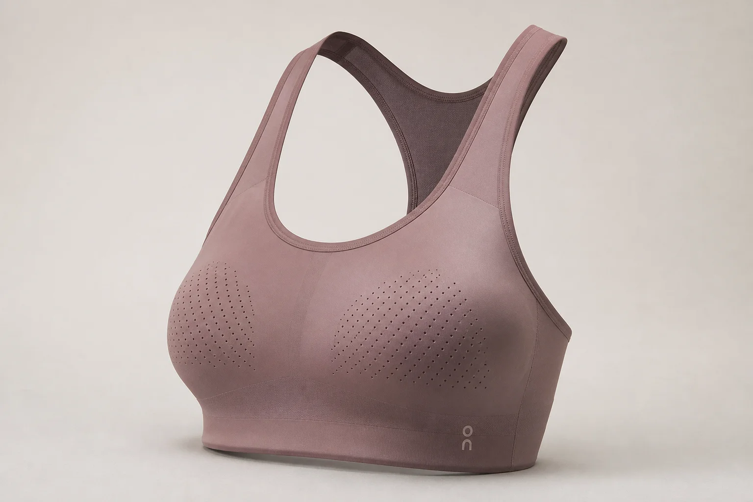 Collection of 12 high-impact sports bras in various styles and colors on neutral backdrop