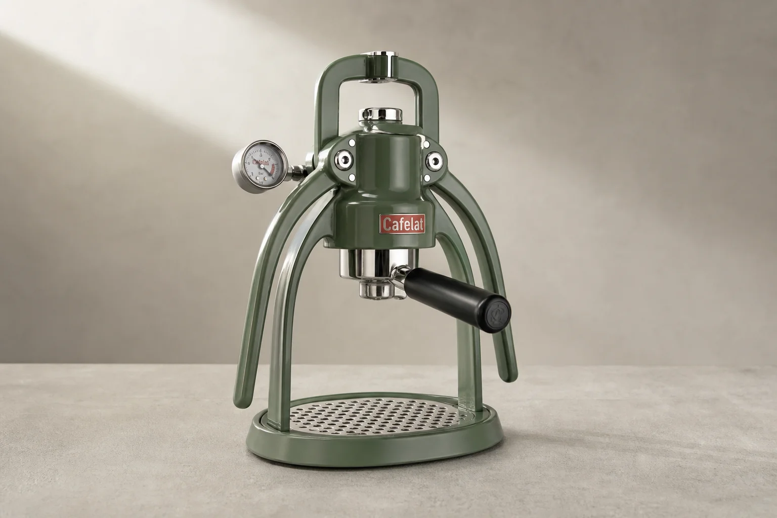 Cafelat Robot Barista Model manual espresso machine in green on concrete surface