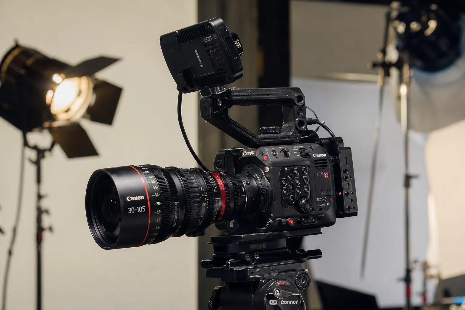 Cinema camera with professional lens on production set with studio lighting