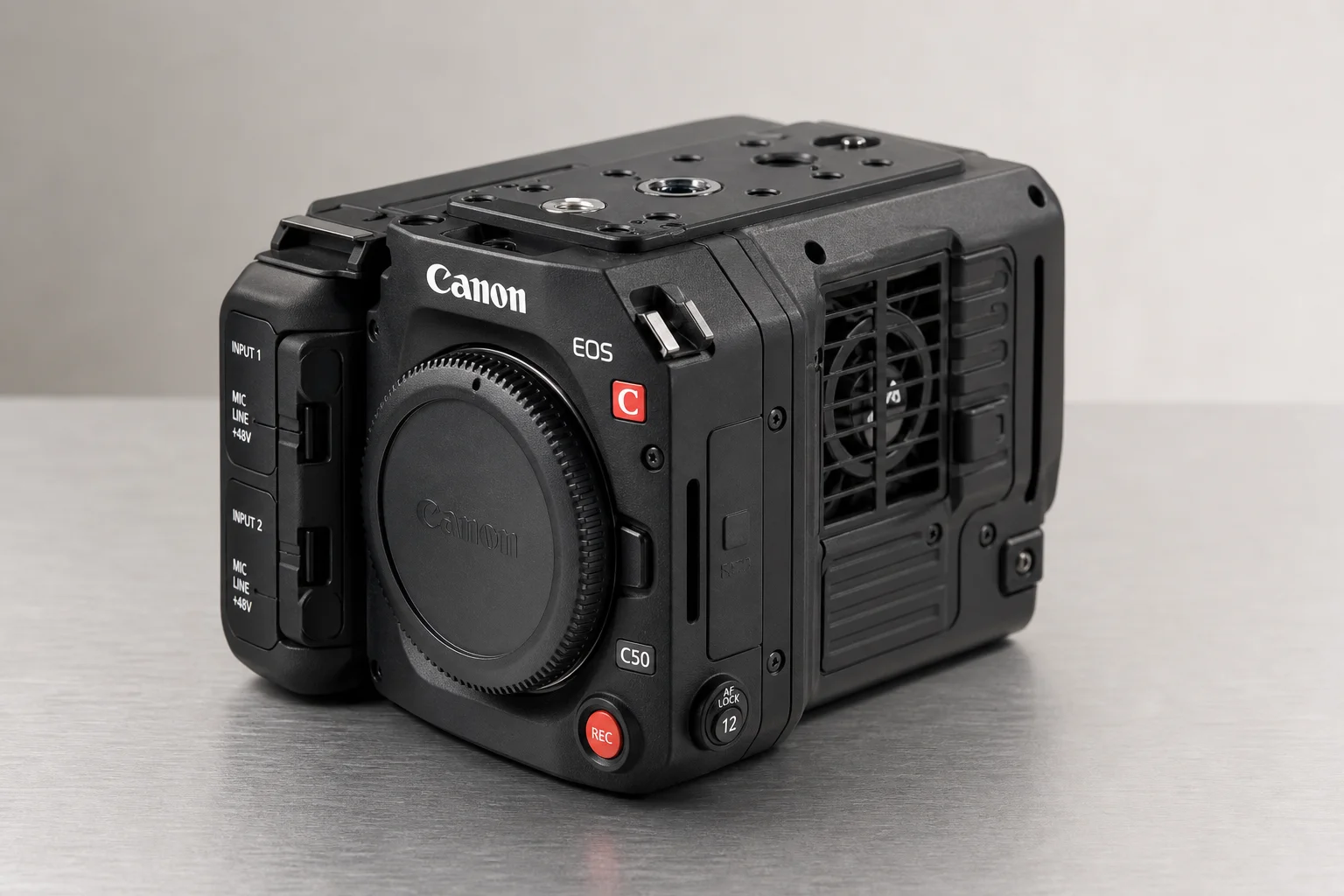 Canon EOS C50 cinema camera on brushed aluminium surface with professional mounting points visible