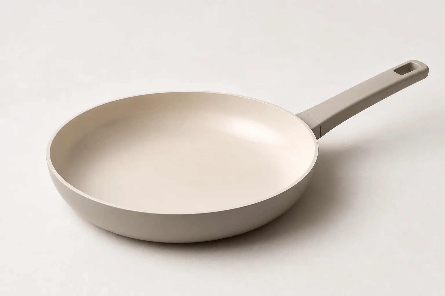 Essential cookware collection including frying pan, saute pan, cast iron skillet, non-stick pan, baking sheet, and Dutch oven