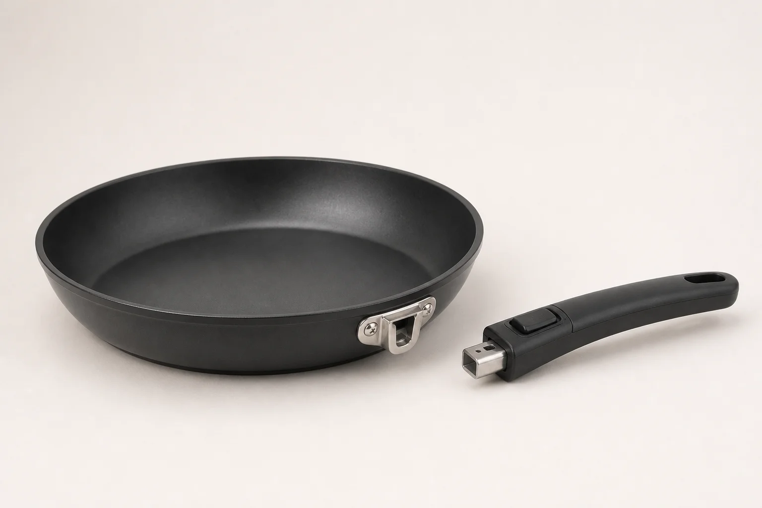 Collection of budget cookware including stainless steel, cast iron, non-stick, and enameled pans