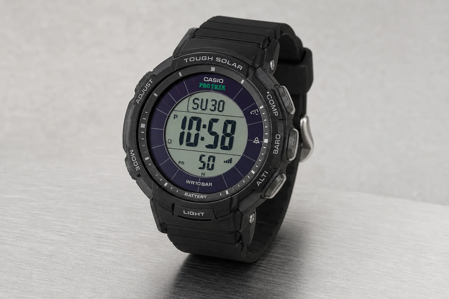 Five rugged outdoor watches arranged on concrete surface