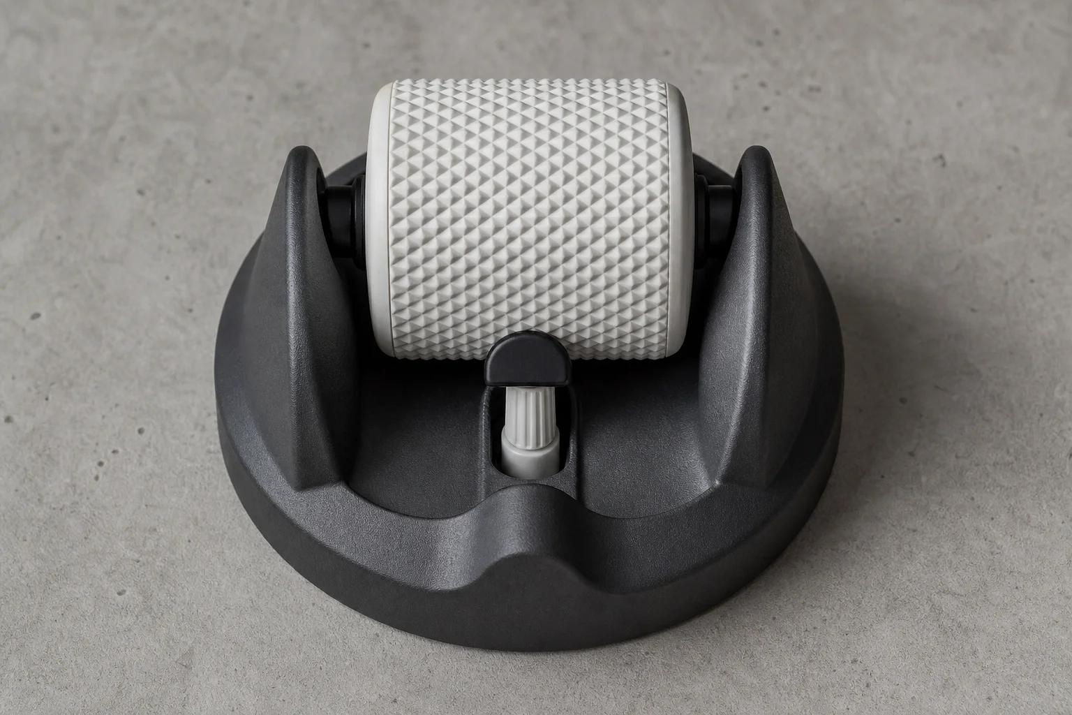 Overhead view of hands-free cradle base with device trigger mechanism engaged