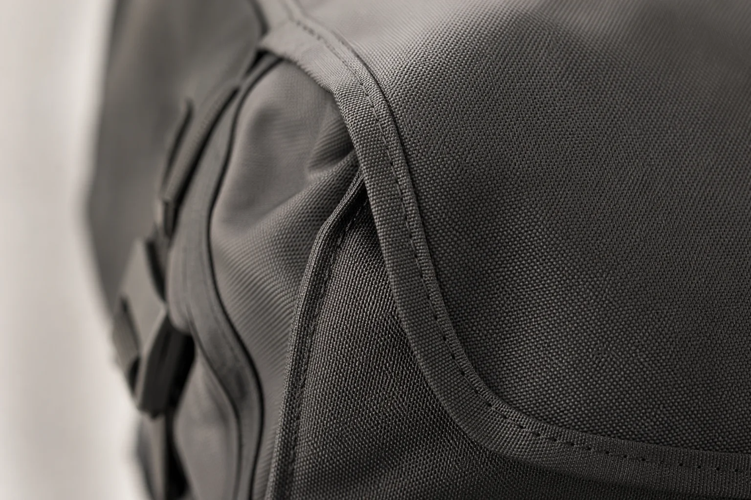Close-up detail of pannier material showing nylon weave and stitching