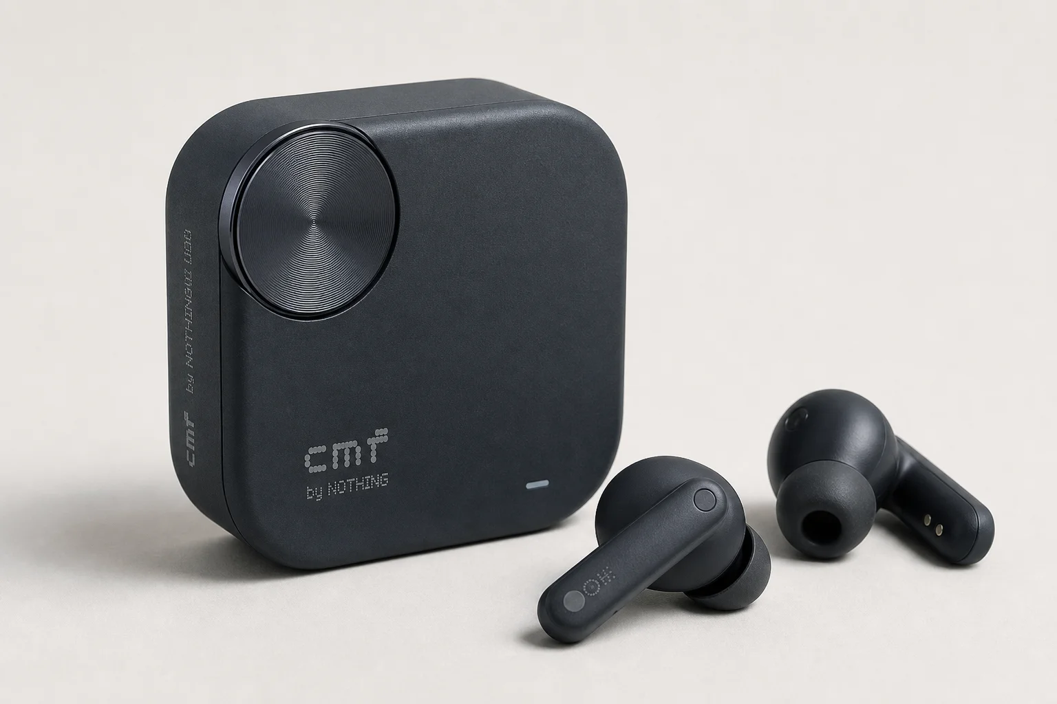 Nine earbud models arranged by price tier on concrete surface