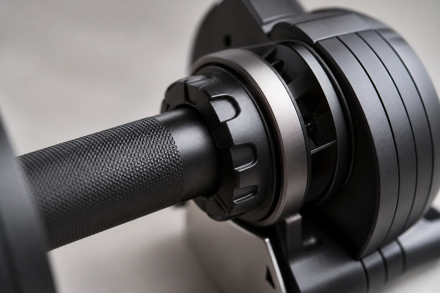 Close-up detail of the Quick Twist adjustment mechanism on a dumbbell handle