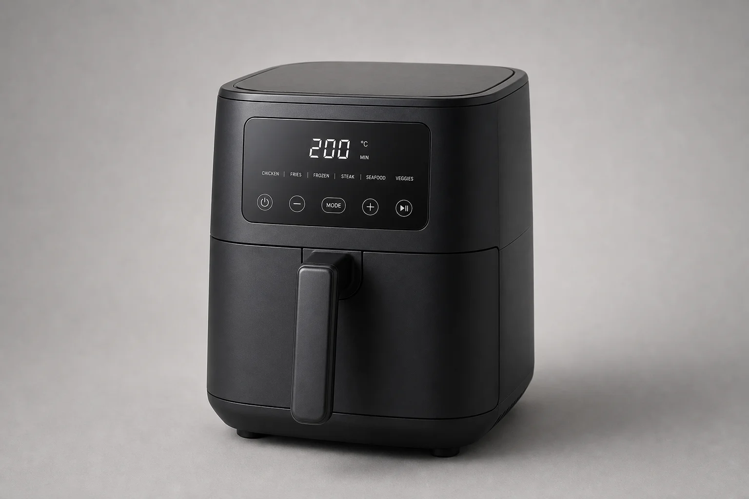 Six air fryer models arranged on concrete surface showing variety of styles and sizes
