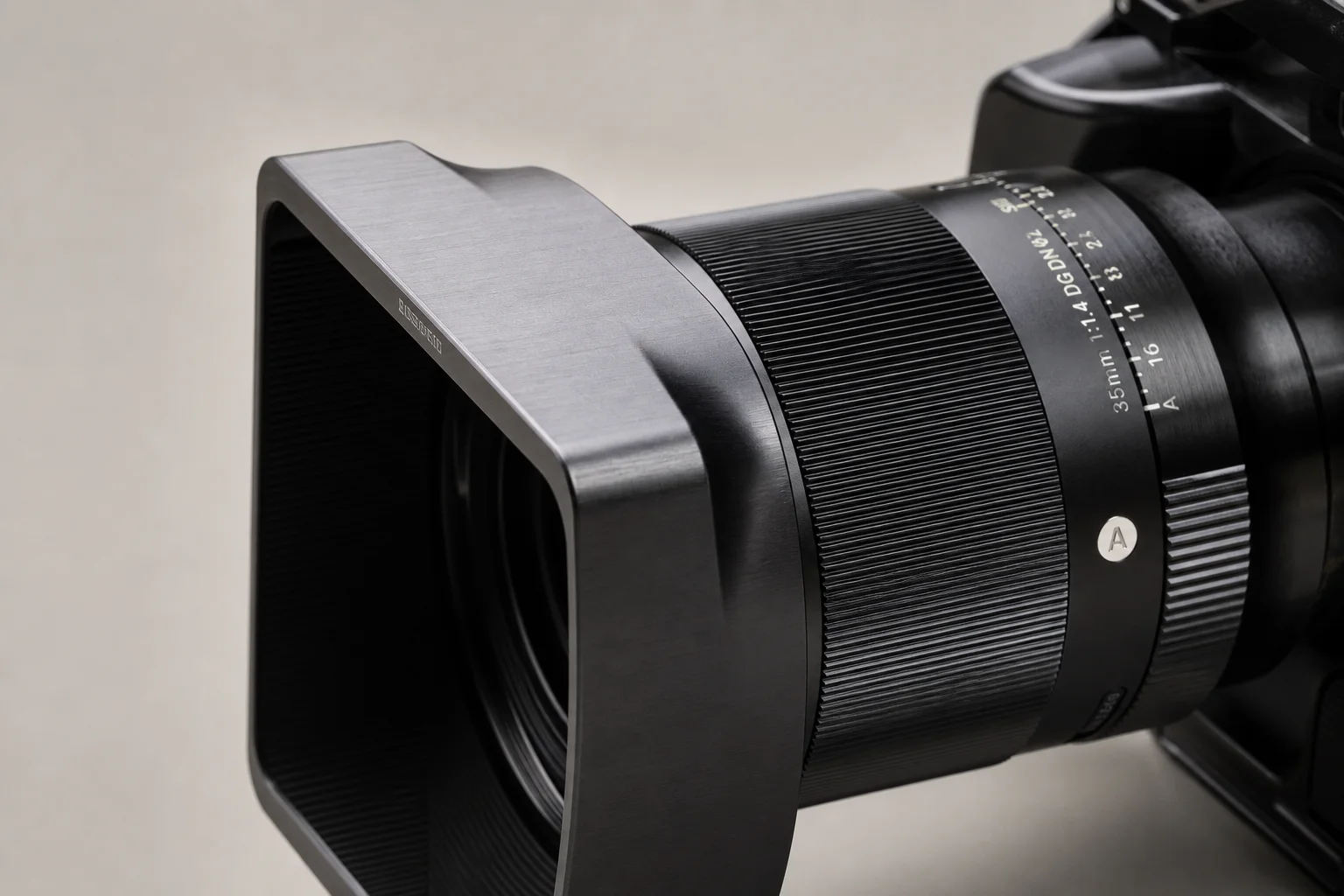 Close-up detail of lens hood and filter attachment on camera lens