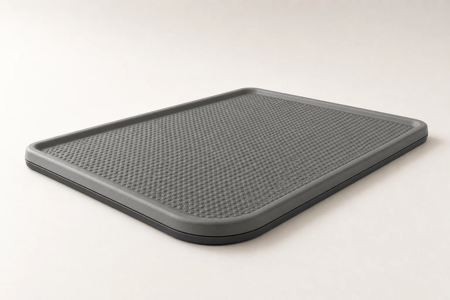 Five anti-fatigue mats and balance boards arranged on grey backdrop