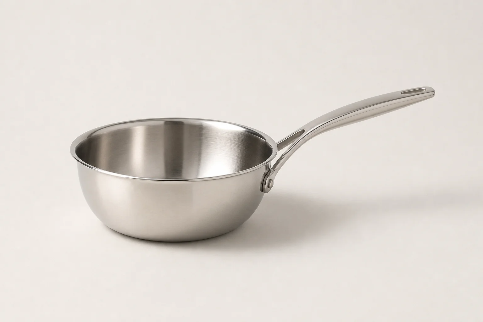 Essential cookware collection including frying pan, saute pan, cast iron skillet, non-stick pan, baking sheet, and Dutch oven