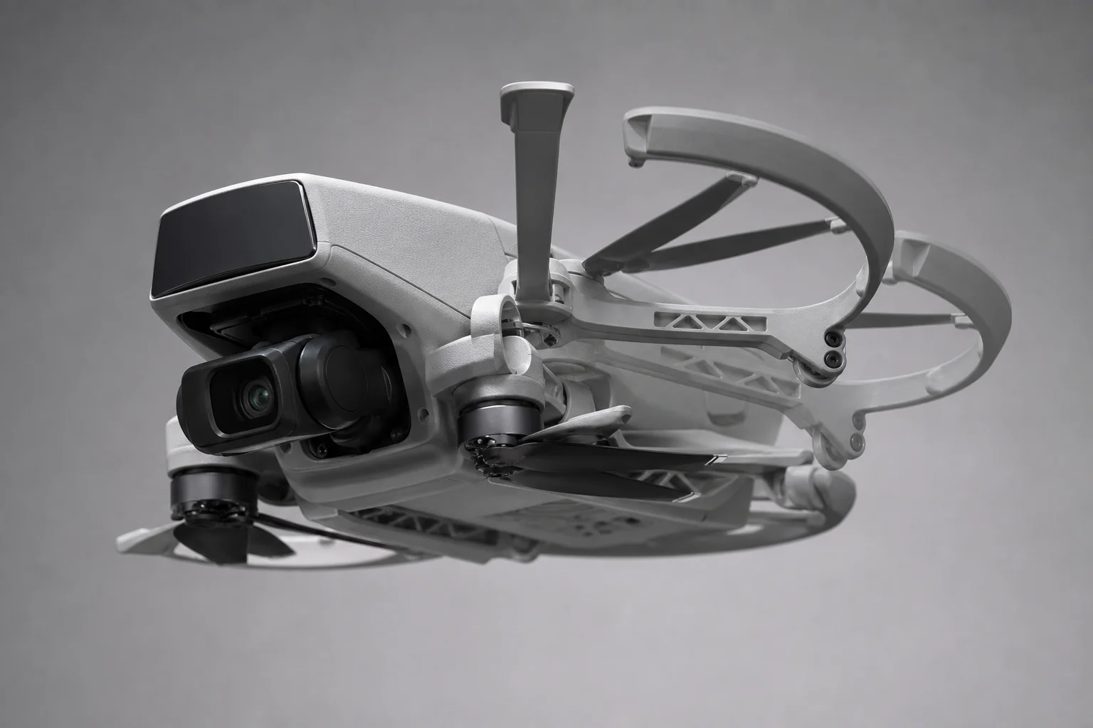 Compact drone unfolding with propeller guards extending outward