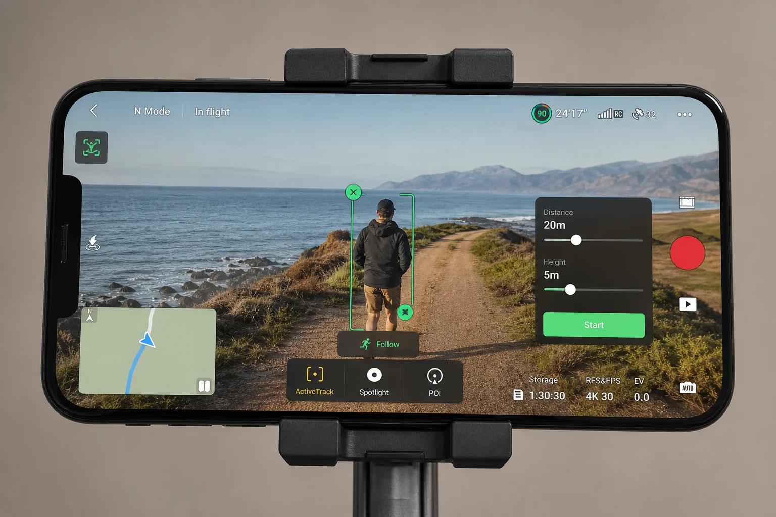 Smartphone displaying DJI Fly app with drone control interface and follow mode options
