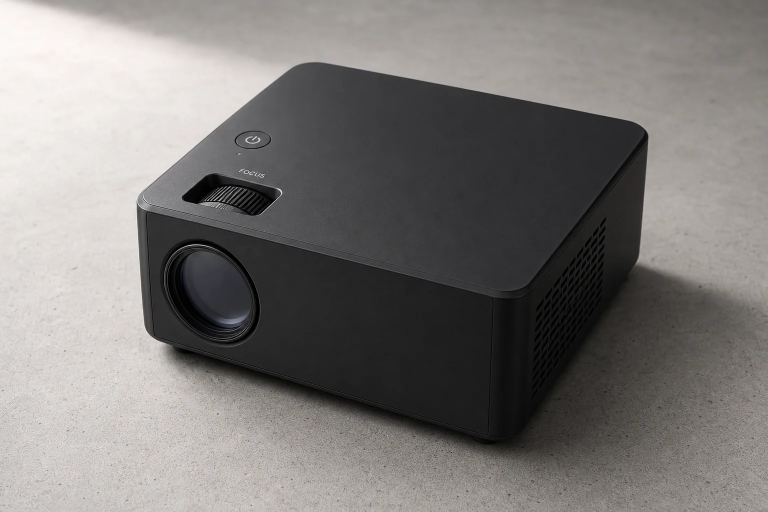 Egate Duster 5X Pro black projector on neutral concrete surface
