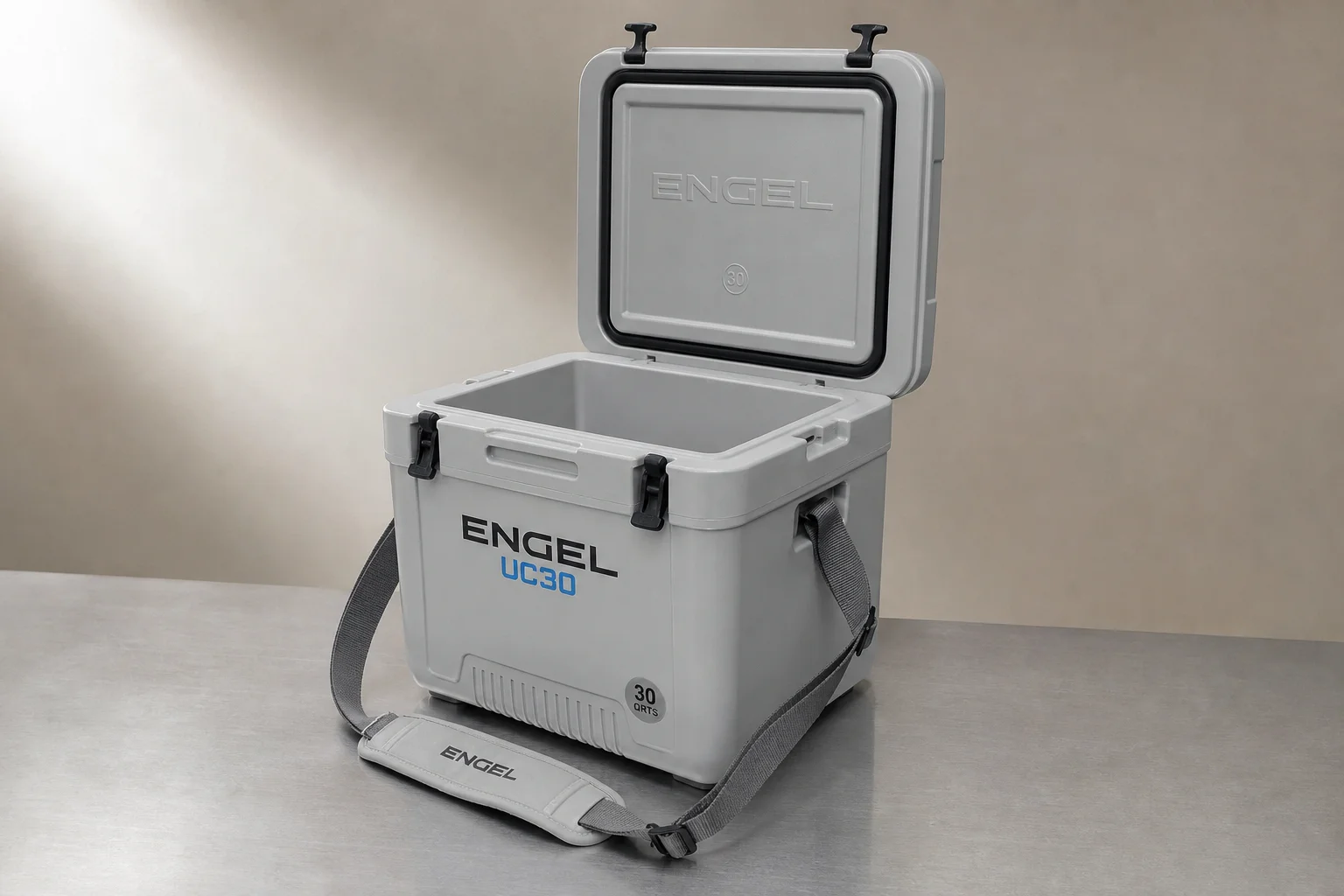 Five coolers arranged by size from smallest to largest on neutral backdrop