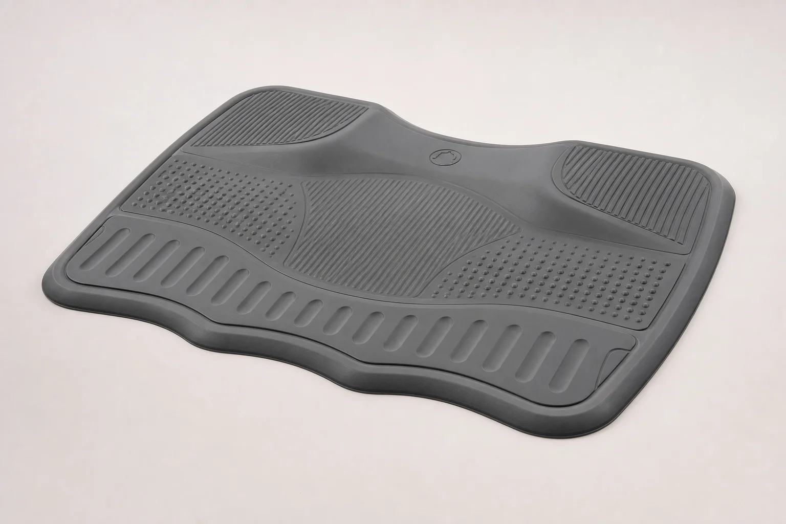 Five anti-fatigue mats and balance boards arranged on grey backdrop