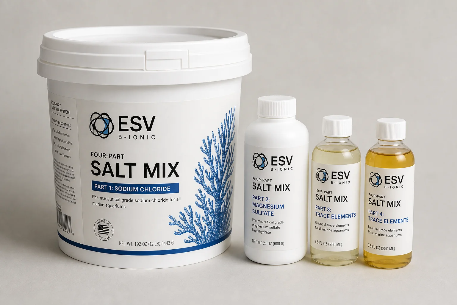 Collection of six saltwater aquarium salt mix buckets on grey surface
