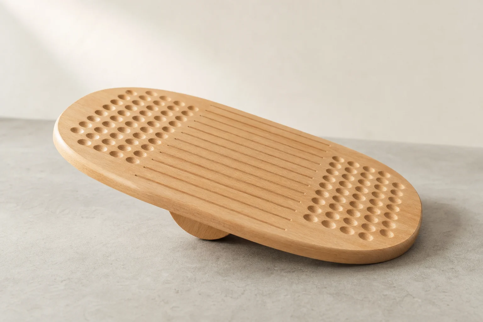 Five anti-fatigue mats and balance boards arranged on grey backdrop
